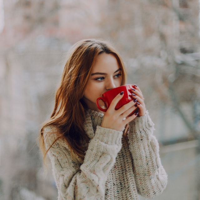 A girl drinking coffee